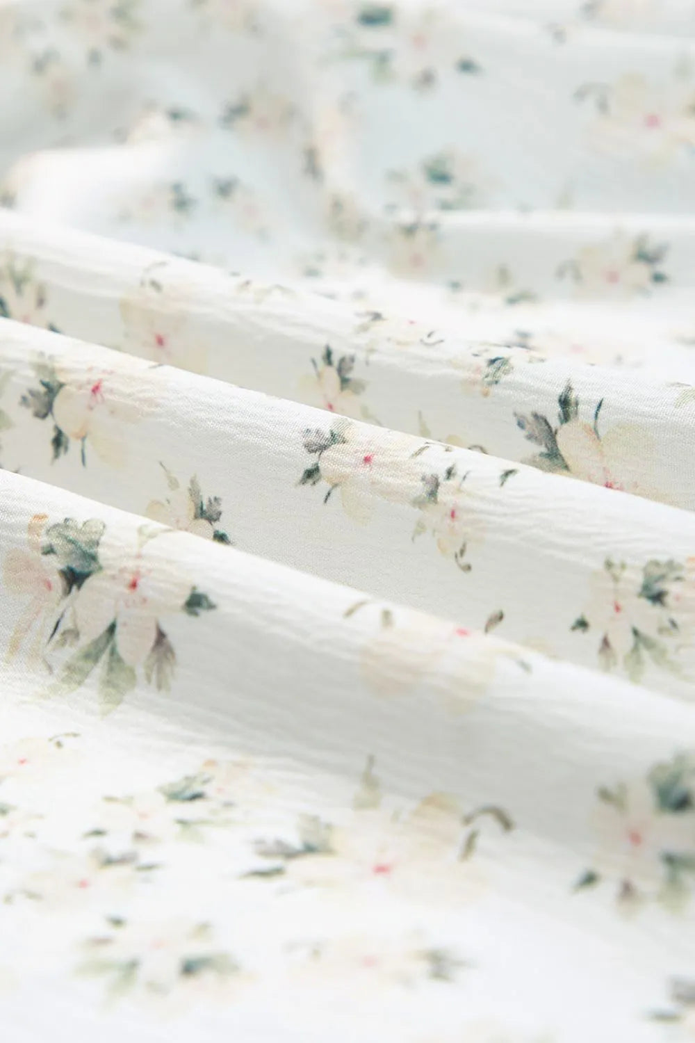 woman-wearing-floral-smocked-short-puff-sleeve-maxi-dress