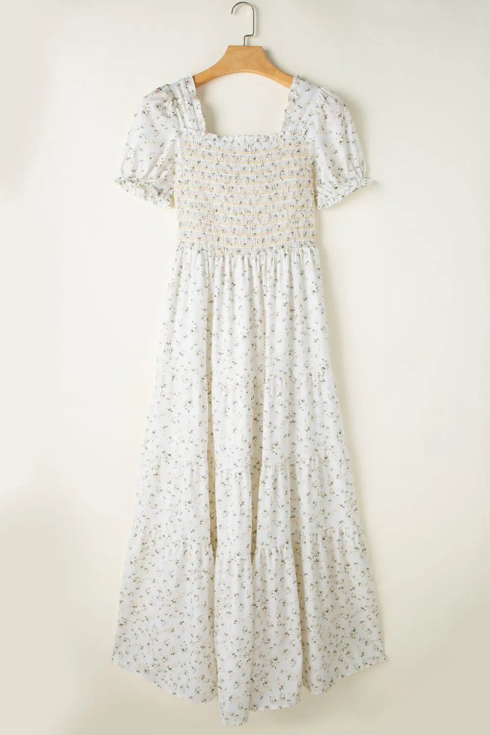 woman-wearing-floral-smocked-short-puff-sleeve-maxi-dress