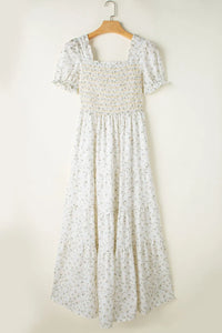 woman-wearing-floral-smocked-short-puff-sleeve-maxi-dress