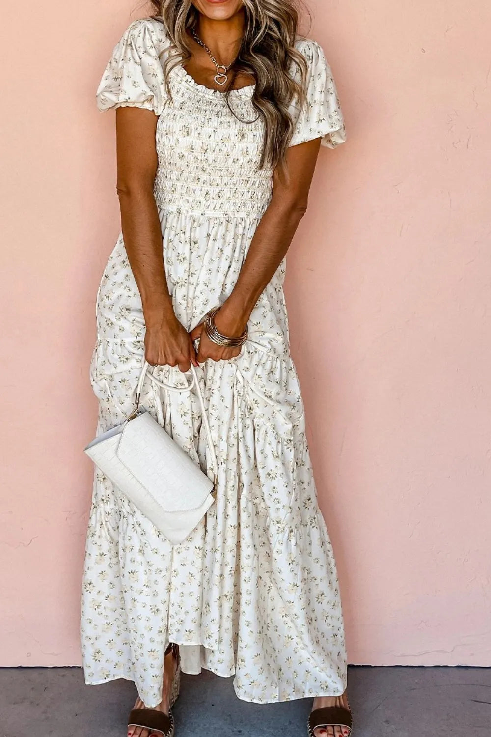 woman-wearing-floral-smocked-short-puff-sleeve-maxi-dress