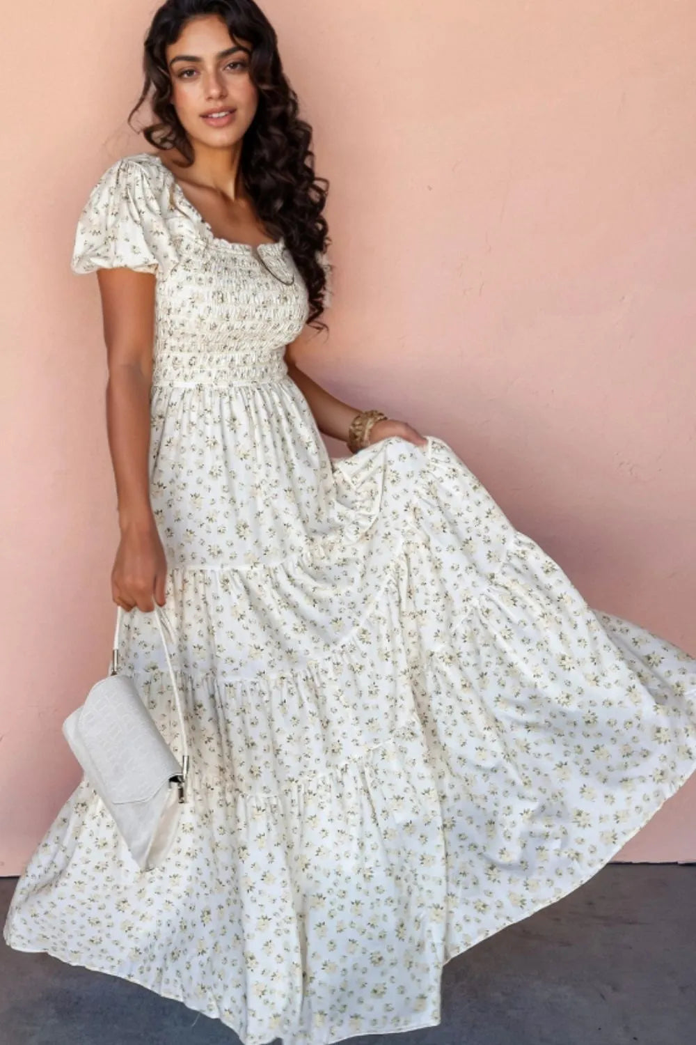 woman-wearing-floral-smocked-short-puff-sleeve-maxi-dress