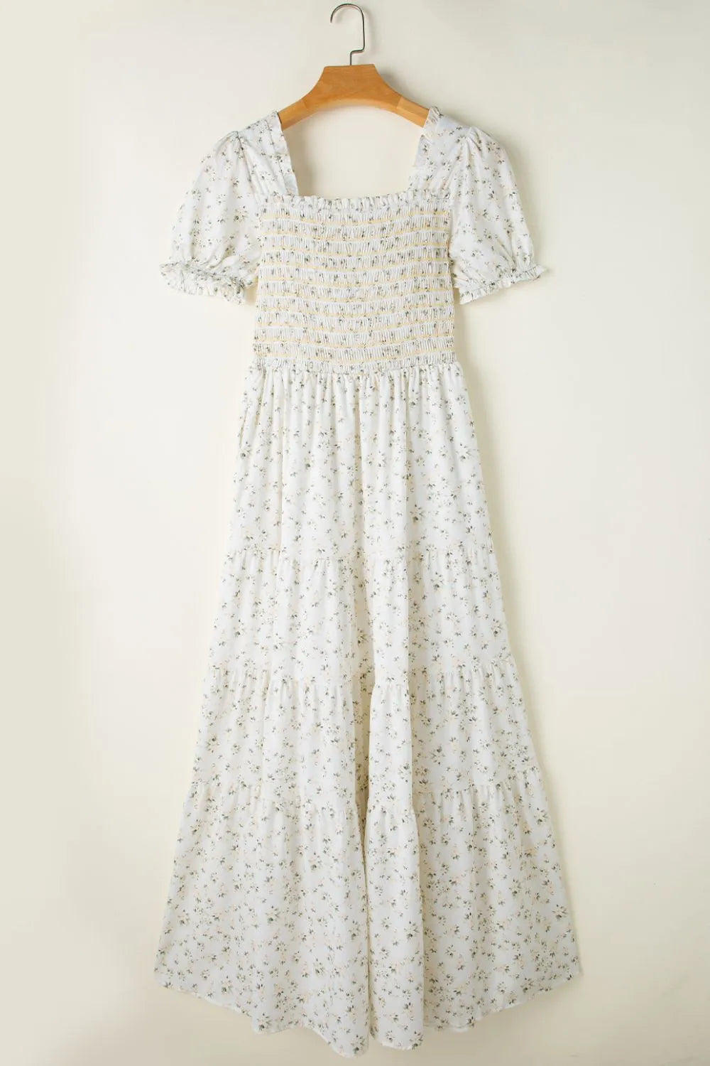 woman-wearing-floral-smocked-short-puff-sleeve-maxi-dress