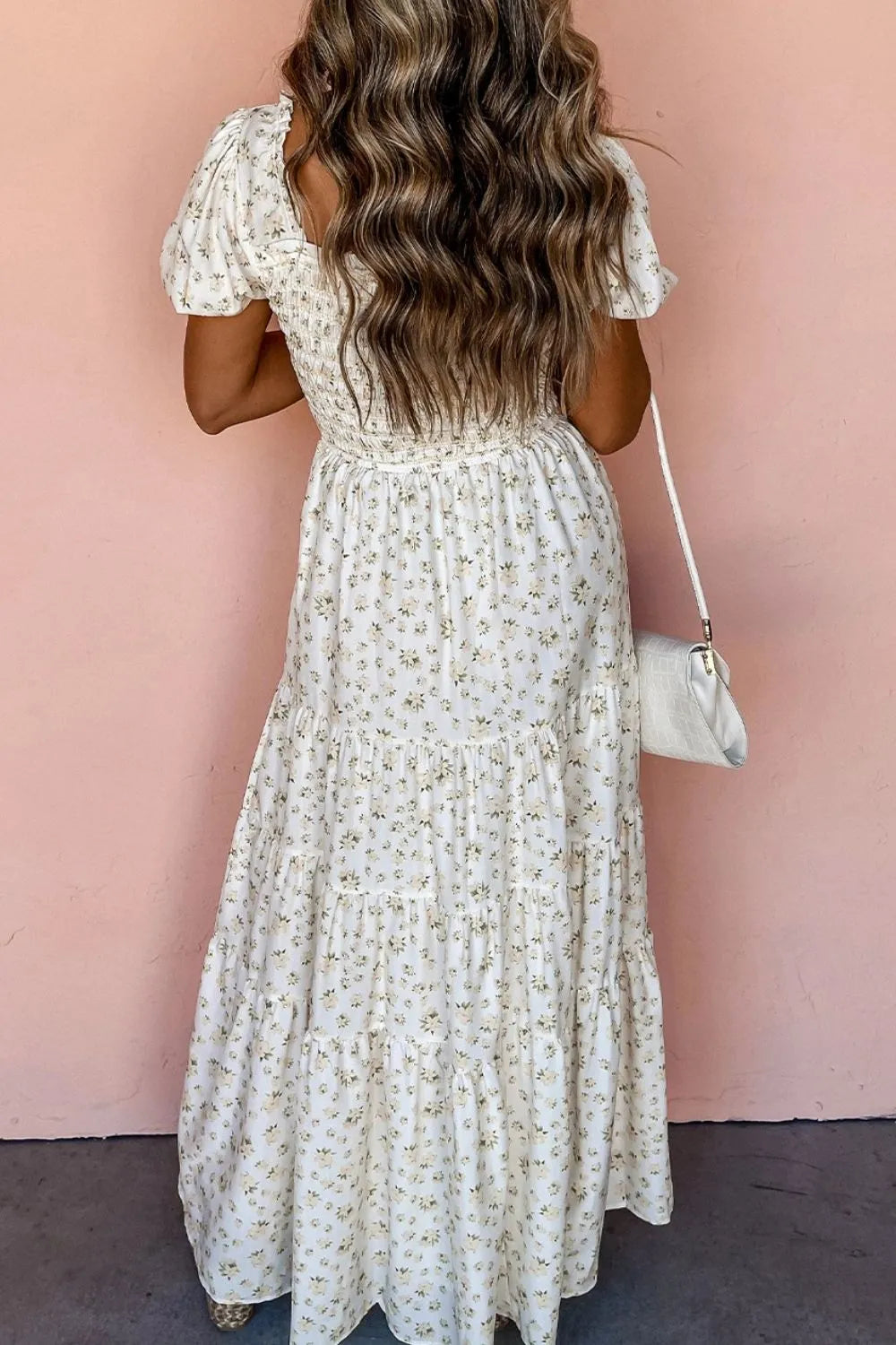 woman-wearing-floral-smocked-short-puff-sleeve-maxi-dress