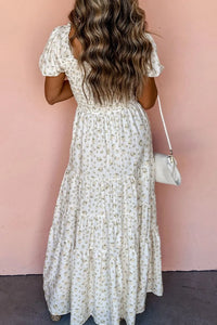 woman-wearing-floral-smocked-short-puff-sleeve-maxi-dress