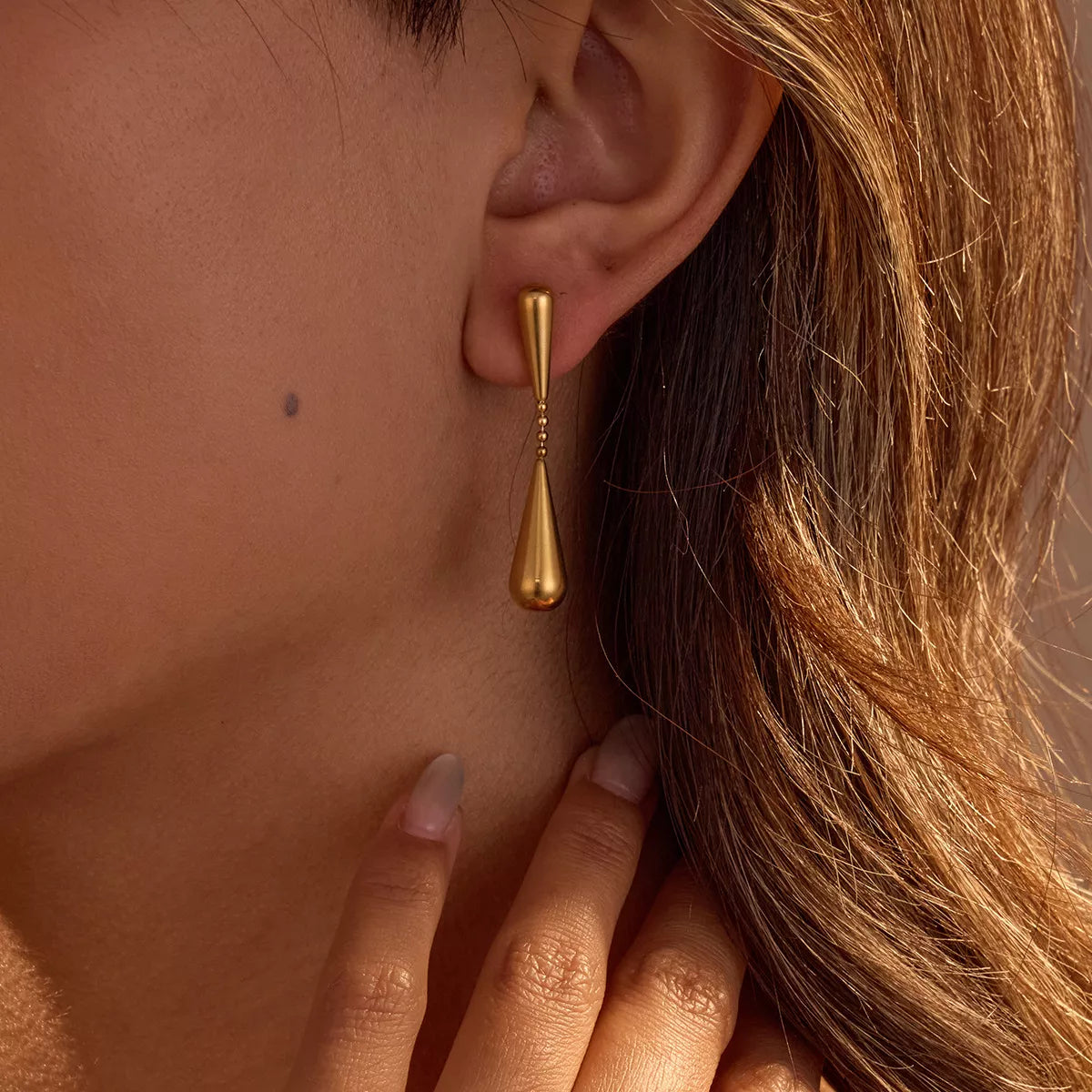 The Fluid Drop Earrings