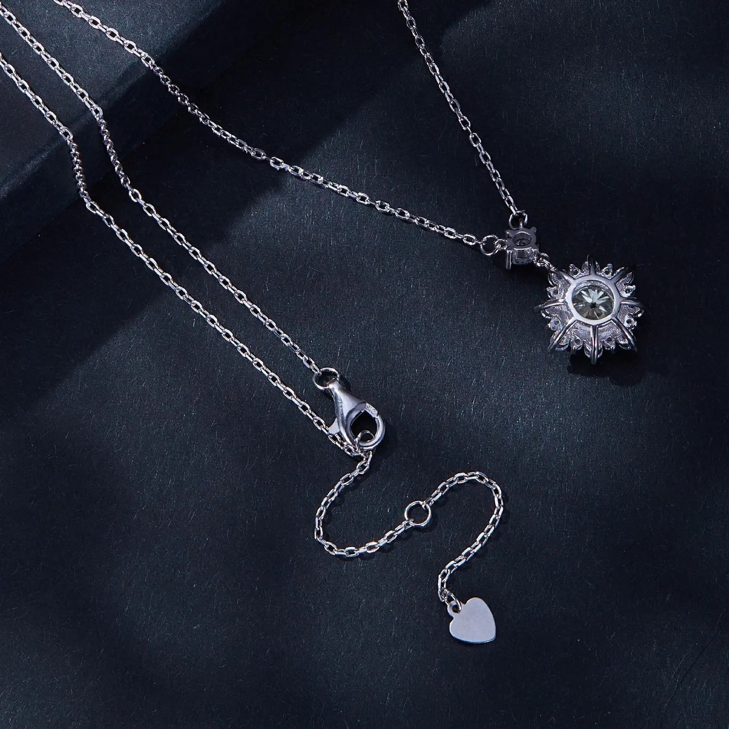Back view of the 925 sterling silver snowflake necklace showing the clasp and chain