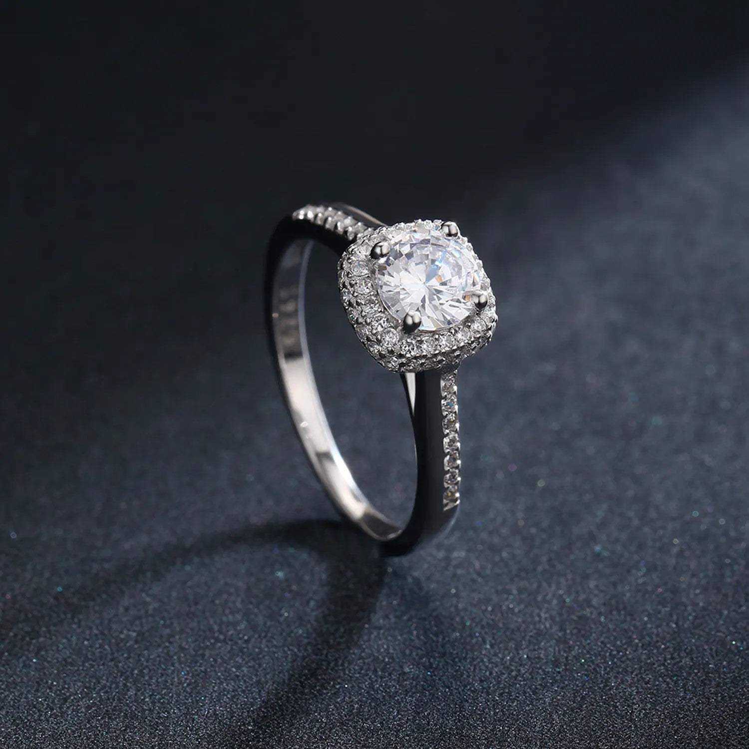 Genuine 925 sterling silver round clear cubic zirconia engagement ring on hand