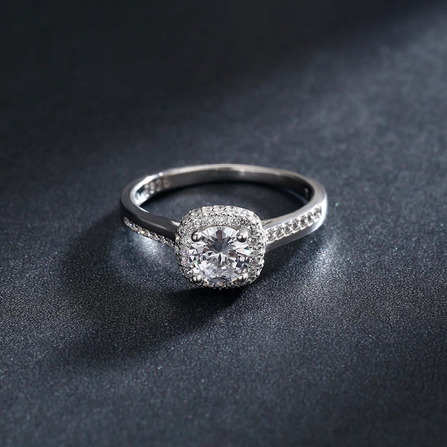 Genuine 925 sterling silver round clear cubic zirconia engagement ring on hand